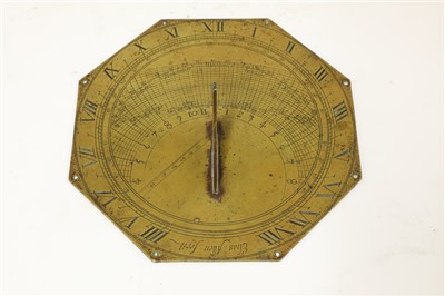Lot 283 - An octagonal brass sundial