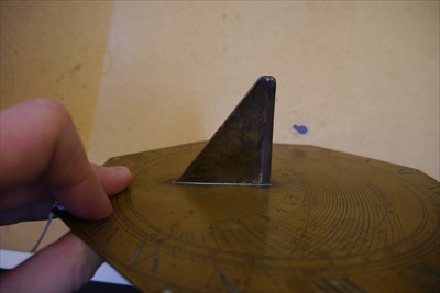 Lot 283 - An octagonal brass sundial