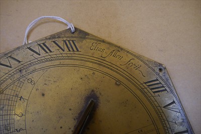 Lot 283 - An octagonal brass sundial