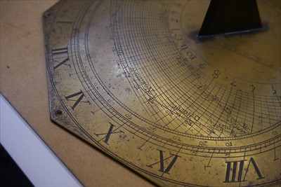 Lot 283 - An octagonal brass sundial