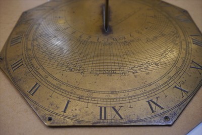 Lot 283 - An octagonal brass sundial