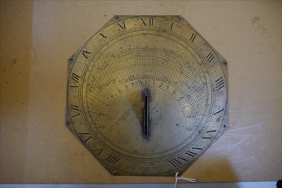 Lot 283 - An octagonal brass sundial