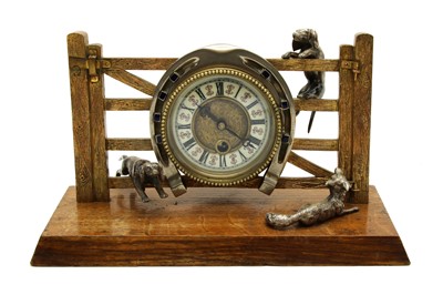 Lot 221 - An Edwardian oak brass and silvered hunting gate clock