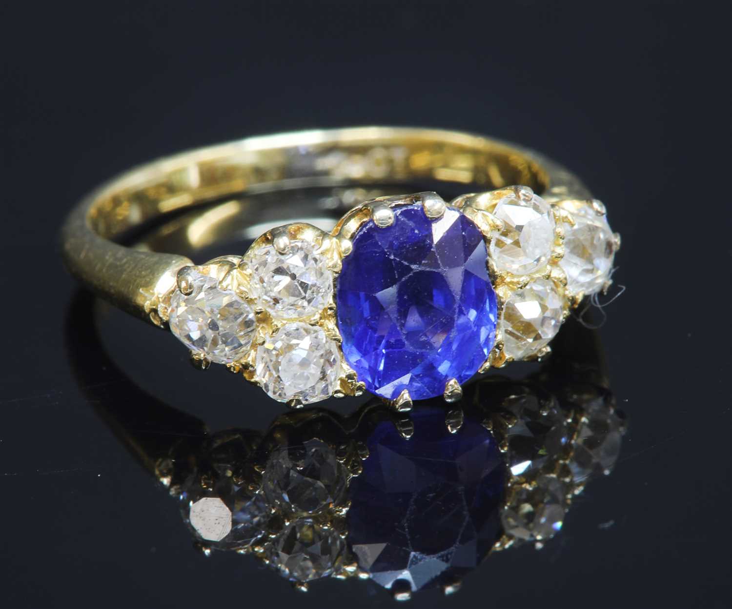 Lot 73 - A late Victorian sapphire and diamond ring