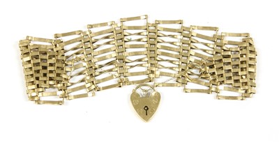 Lot 41 - A 9ct gold ten row gate bracelet