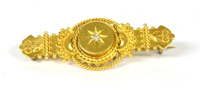 Lot 38 - A 15ct gold Etruscan revival bar brooch