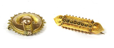 Lot 63 - Two Victorian Etruscan revival style brooches