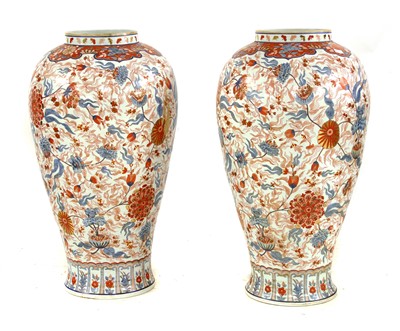 Lot 741 - A pair of large Imari style temple vases and covers