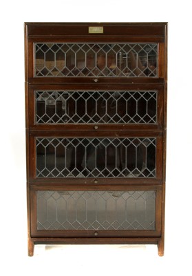 Lot 620 - A Gunn four part sectional bookcase