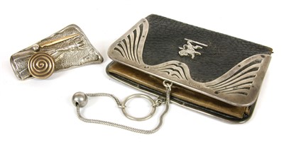 Lot 157 - A silver mounted leather purse
