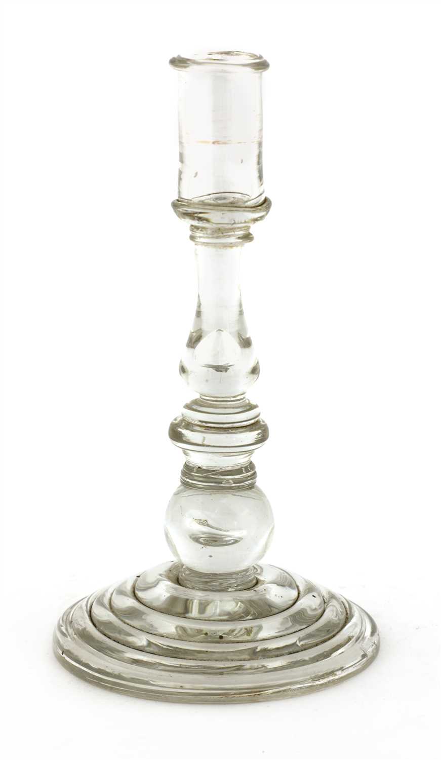 Lot 265 - A glass taperstick