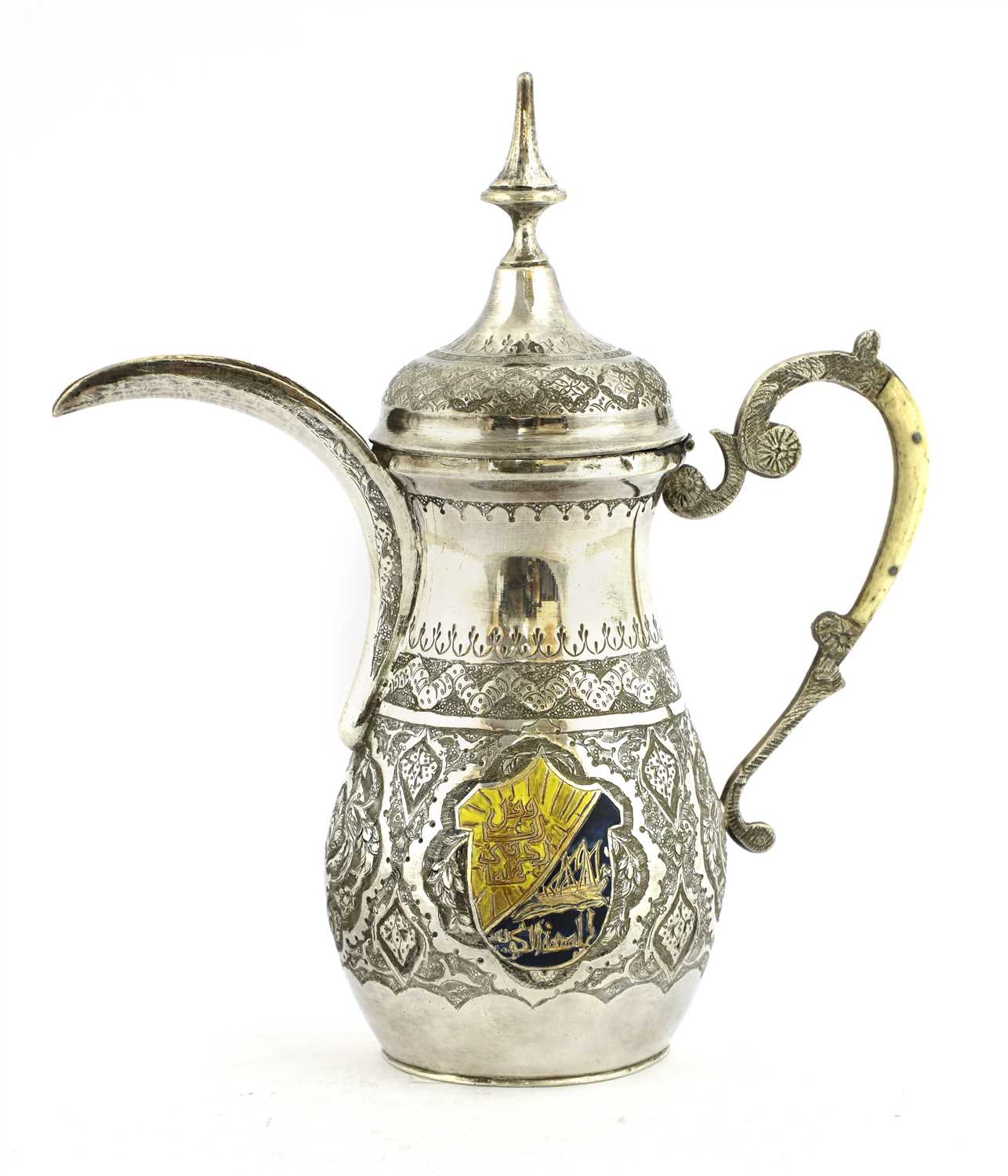 Lot 87 - An Islamic white metal dallah coffee pot