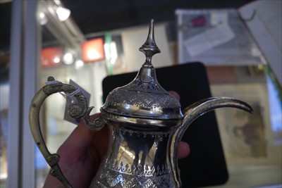 Lot 87 - An Islamic white metal dallah coffee pot