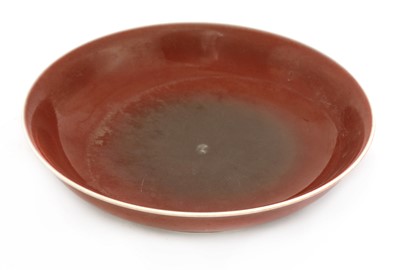 Lot 408 - A Chinese red glazed plate