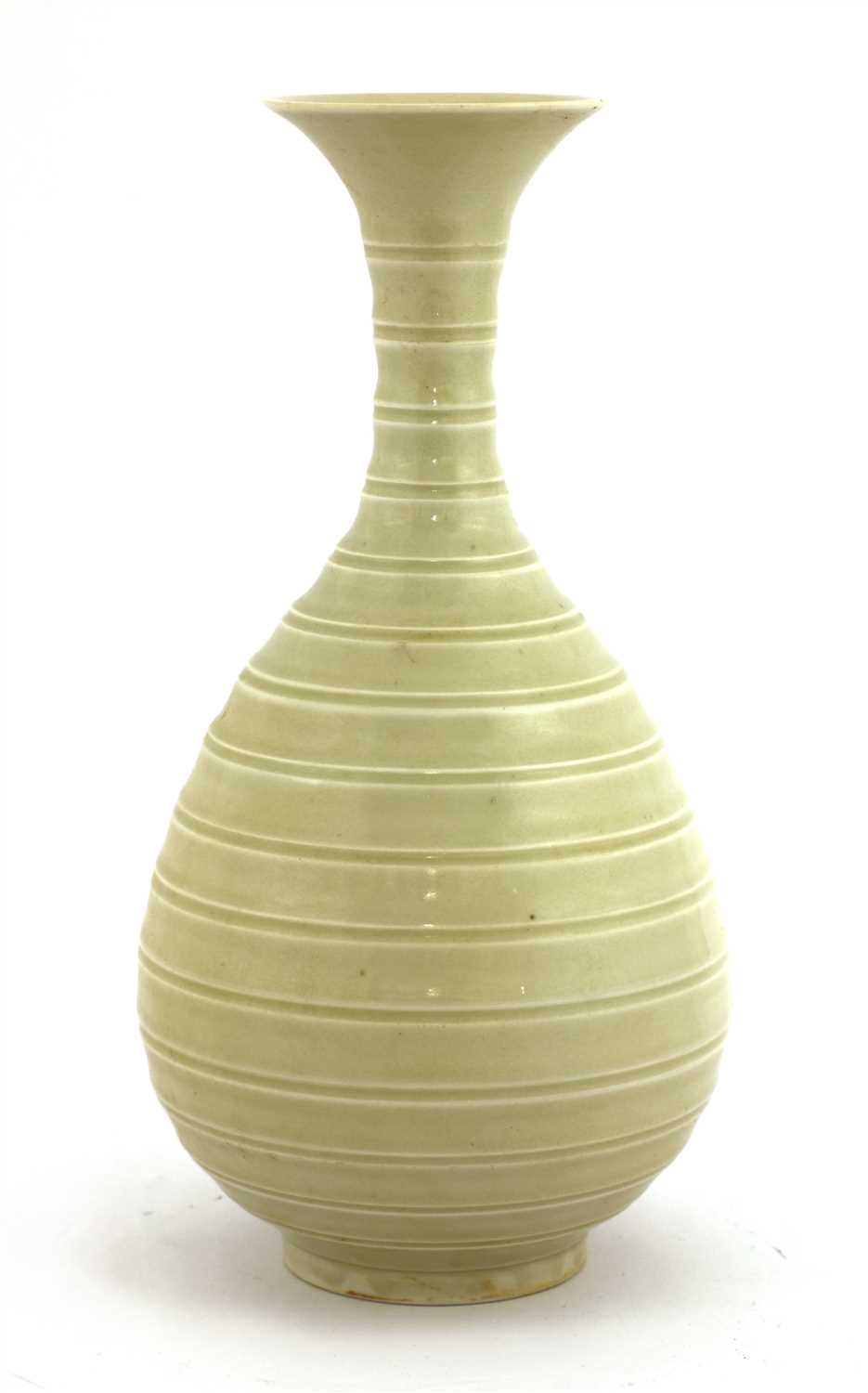 Lot 477 - A Chinese Ding ware vase