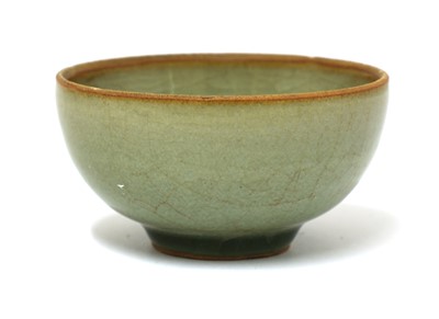 Lot 469 - A Chinese celadon tea bowl