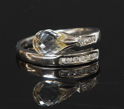 Lot 433 - A 14ct white gold rock crystal and diamond crossover ring