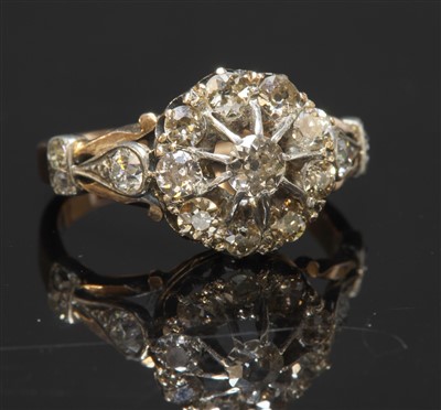 Lot 86 - An Edwardian rose gold and silver diamond set cluster ring, c.1905