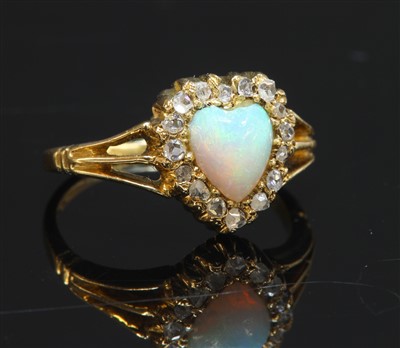 Lot 92 - An Edwardian opal and diamond heart-shaped cluster ring