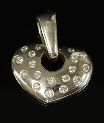 Lot 464 - A white gold diamond heart pendant