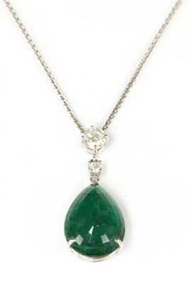 Lot 452 - An 18ct white gold emerald and diamond pendant