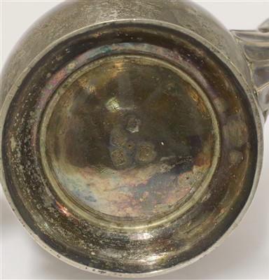 Lot 33 - A George II silver hot water pot