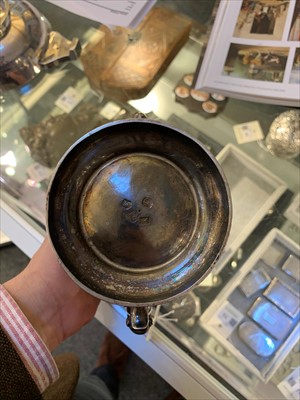 Lot 33 - A George II silver hot water pot