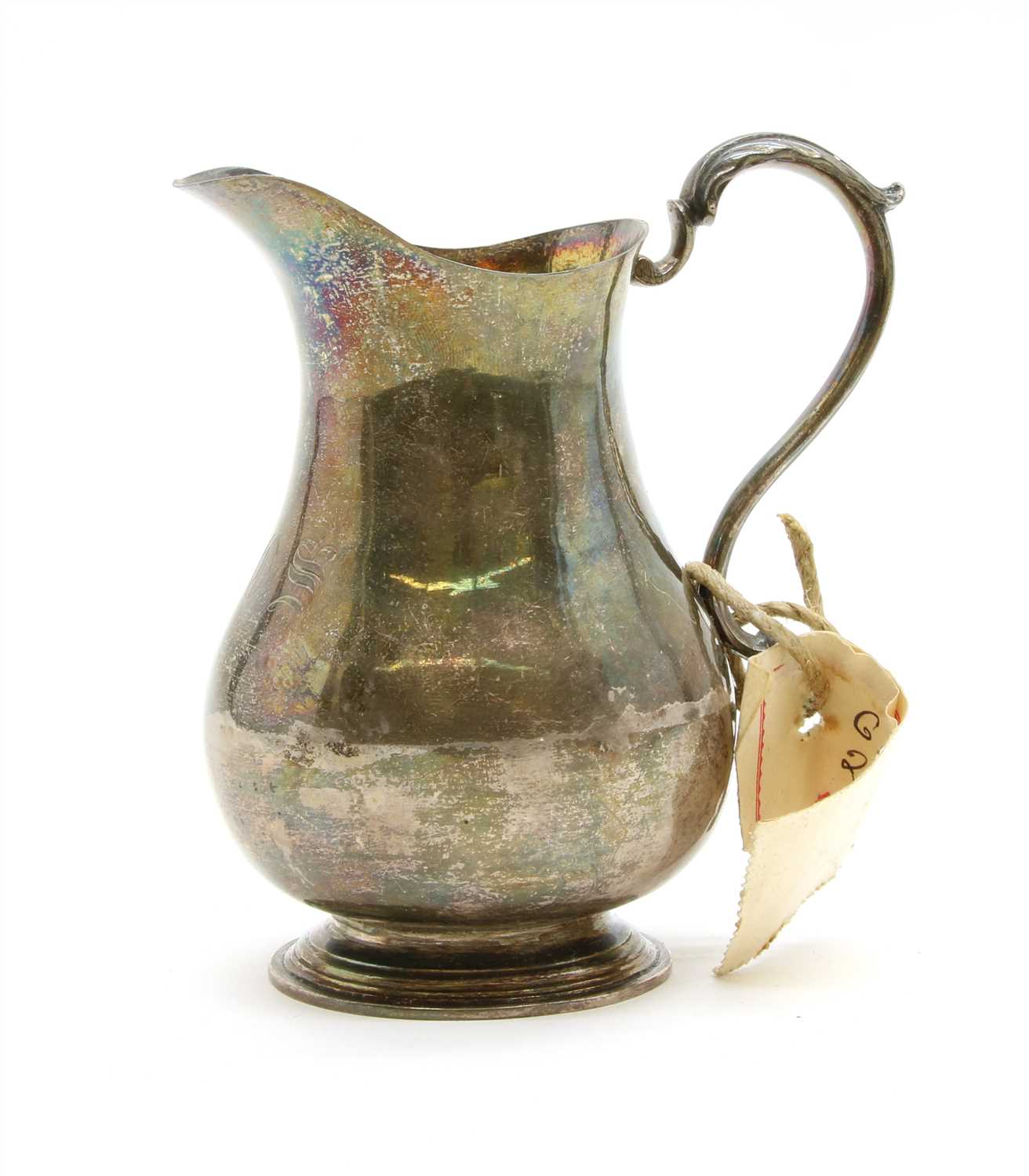 Lot 195 - A George II silver cream jug