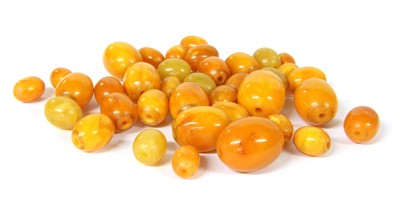 Lot 25 - Loose oval amber beads