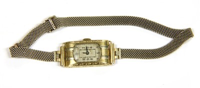Lot 100 - A gold mechanical Optima wristwatch