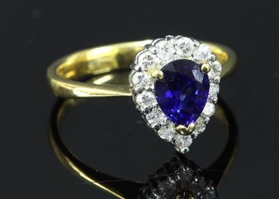 Lot 308 - A gold sapphire and diamond cluster ring