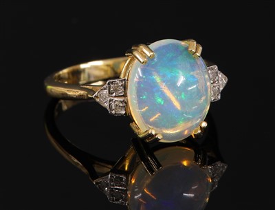 Lot 358 - An 9ct gold opal and diamond ring