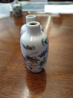 Lot 156 - Three Chinese famille rose snuff bottles