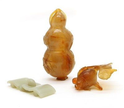 Lot 95 - A jade buckle and two agate carvings