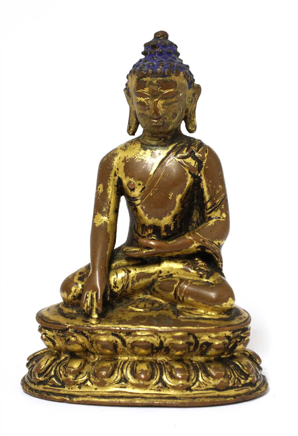 Lot 119 - A Tibetan gilt bronze Buddha