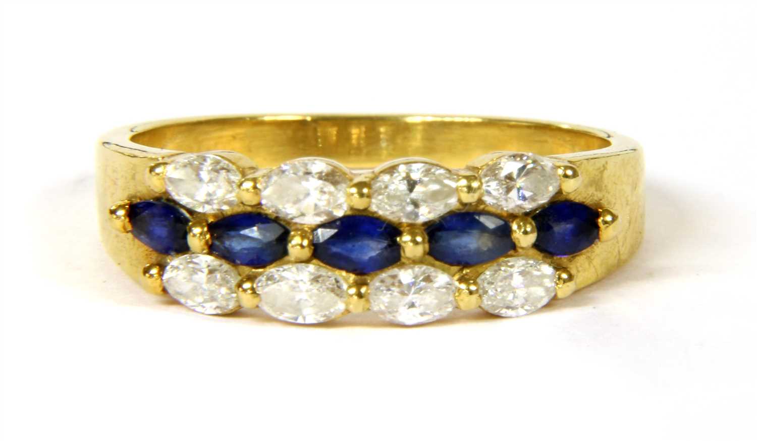 Lot 18 - An 18ct gold sapphire and diamond ring