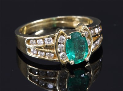 Lot 341 - A gold emerald and diamond ring