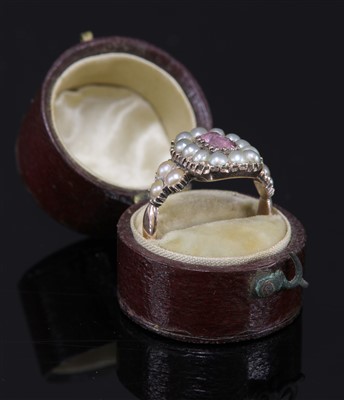 Lot 3 - A cased Georgian pink topaz and split pearl cluster ring
