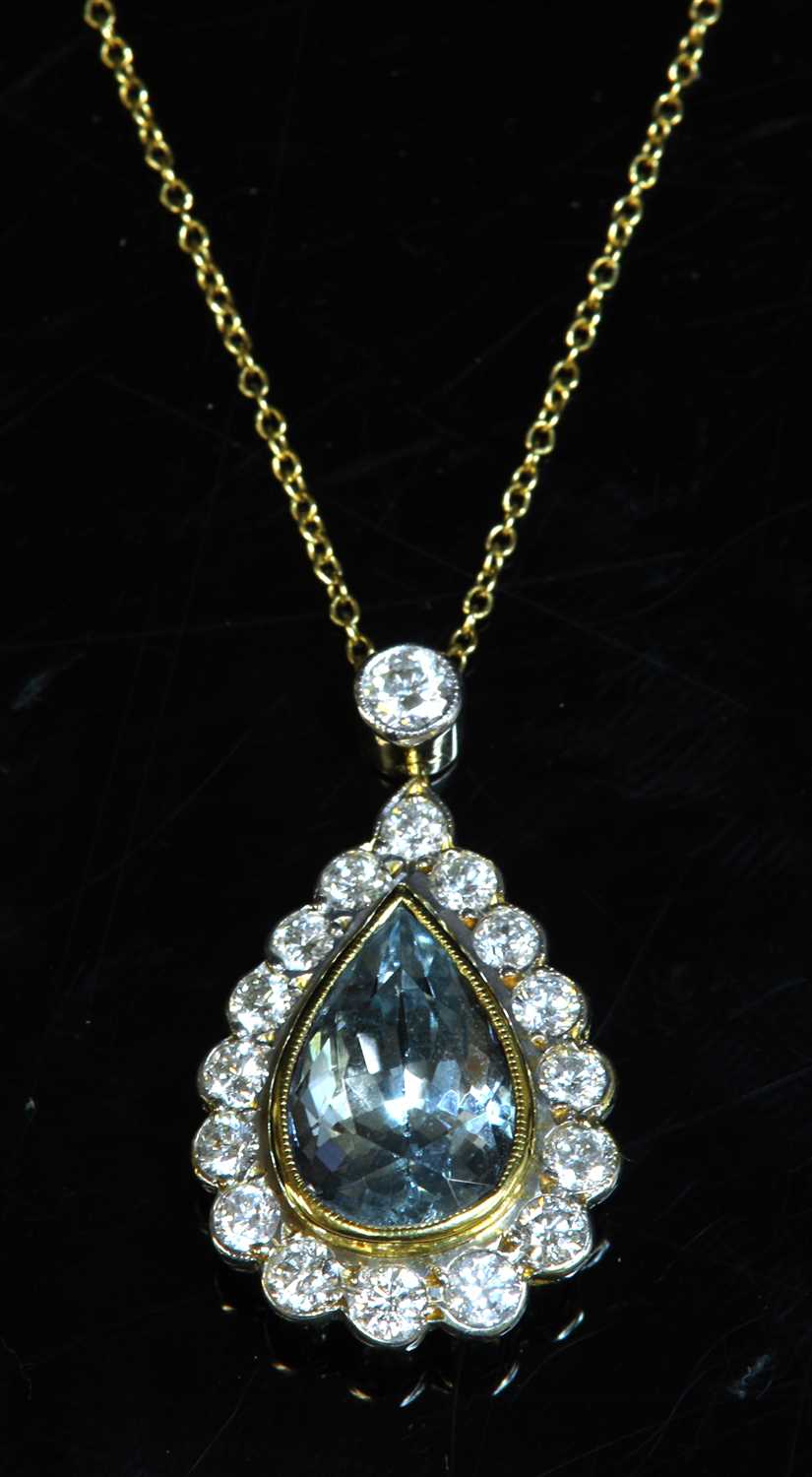 Lot 365 - A yellow and white gold aquamarine and diamond pendant