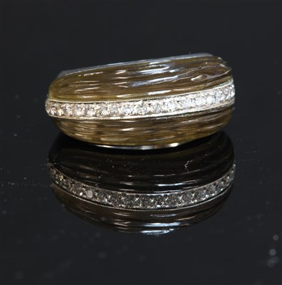 Lot 536 - A white gold carved smoky quartz and diamond tapered band ring