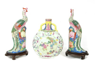 Lot 1360 - A pair of Chinese famille rose figures