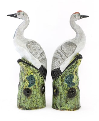 Lot 427 - A pair of Chinese porcelain cranes