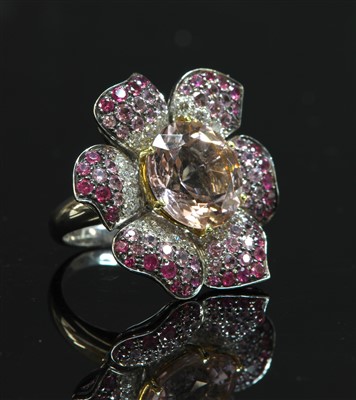 Lot 559 - A white gold morganite, pink sapphire and diamond flowerhead cluster ring, by Picchiotti