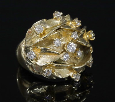 Lot 243 - A Continental gold diamond bombé dress ring