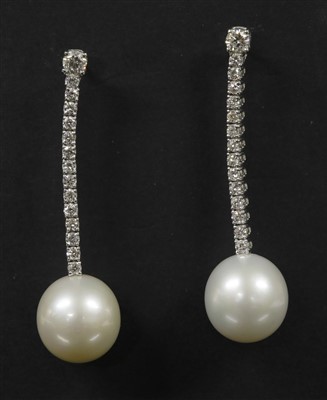 Lot 385 - A pair of Continental white gold cultured South Sea pearl and diamond drop earrings