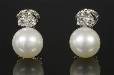 Lot 386 - A pair of Italian white gold cultured South Sea pearl and diamond drop earrings