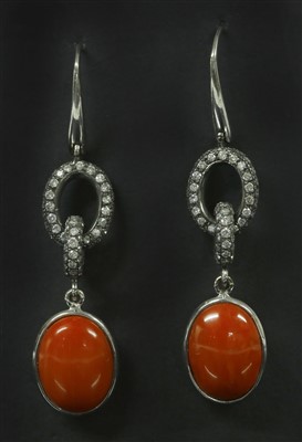Lot 108 - A pair of Continental white gold coral and diamond drop earrings