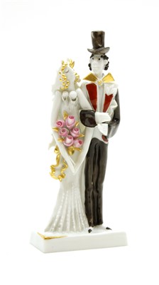 Lot 200 - A Meissen porcelain bride and groom figural group