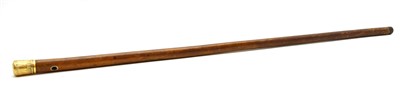 Lot 553 - A gold capped malacca walking stick