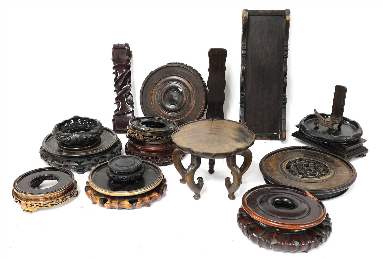 Lot 430 - A collection of Chinese wood stands
